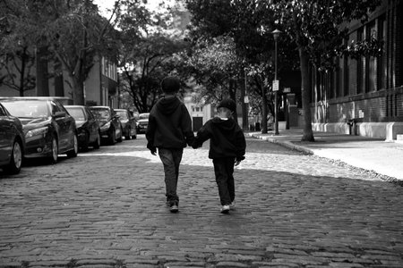 Brothers walkting togetherのeditorial素材