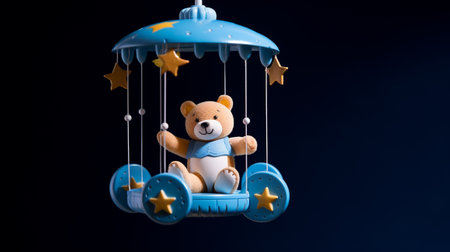 Baby cot mobile. Musical Toy. Cute baby crib with toys on blue background. 3d renderingの素材