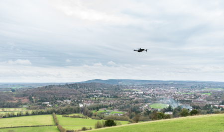 BOX HILL, DORKING, ENGLAND - JANUARY 12 2019: Drone flying over the view from Box Hill in the Surrey Hills, England, UK on a cloudy winter day. The background stretches to Leith Hill from Dorking.のeditorial素材