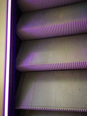 Escalator purple neon lightの写真素材