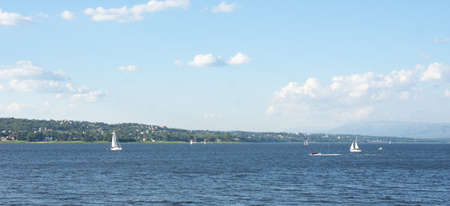 SAILBOAT STRANDED IN LAKE ON A SUNNY DAYの写真素材