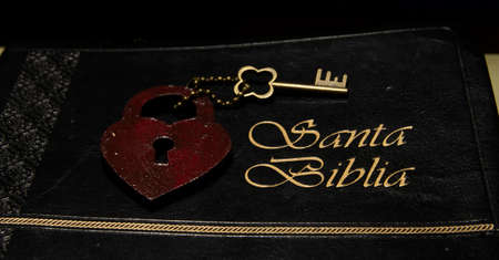 holy bible shown from the cover with a heart on topの写真素材