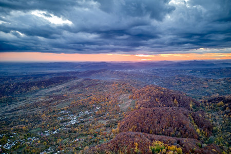 Aerial top view of the autumn forest and hills in Romania. Autumn landscapeの写真素材
