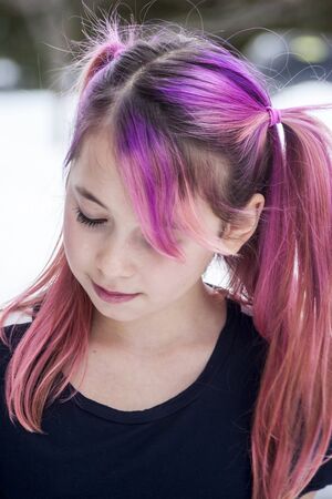 Pre Teen Girl With Pink Hairの写真素材