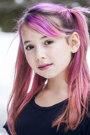 Pre Teen Girl With Pink Hairの写真素材