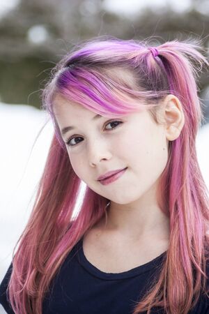 Pre Teen Girl With Pink Hairの写真素材