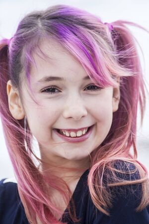 Pre Teen Girl With Pink Hairの写真素材