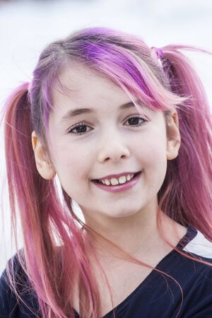 Pre Teen Girl With Pink Hairの写真素材