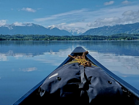 Kayak on a lake with mountains in the background, Austria.の写真素材