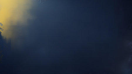 Abstract blue and yellow light streaks in darknessの素材