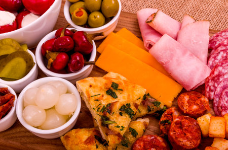 Antipasto Sharing Platter A large wooden sharing platter of Antipasto.