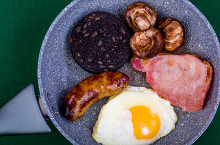 Ulster Fry Breakfast. Ulster Fry breakfast or all-day breakfast, a selection of fried breakfast food often served with Sourdough bread and hot fresh coffee.の写真素材