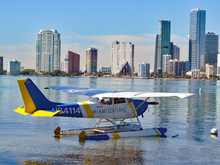 Small chartered sea plane preparing to taxi on Biscayne Bay for a sightseeing flight over Miami,Florida.のeditorial素材