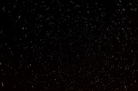 starry sky 6 minute exposure time. the stars turns around the polar star, so direction northの写真素材