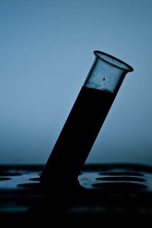 Test tube with a blue fluidの写真素材
