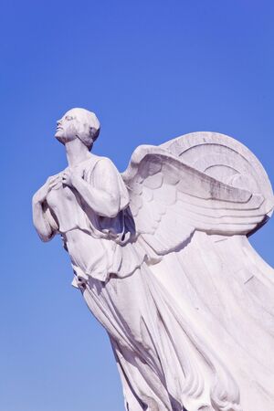 Isolated Angle Sculpture with Blue Sky Background.の写真素材