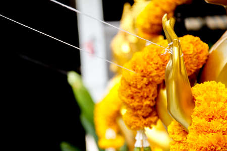 Flower Garland for worship the Buddha Statue.の写真素材
