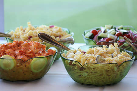 Pasta salad in glass bowlsの写真素材