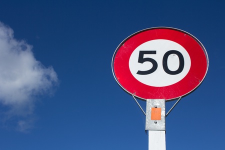 Speed limit sign for restricted zone in urban areas of 50 kmhの写真素材