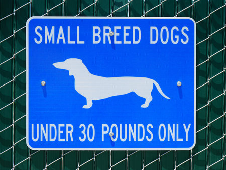 Dog park sign small breed dogs only.