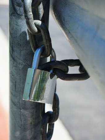 Close up of lock and chain on gate COVID-19の写真素材