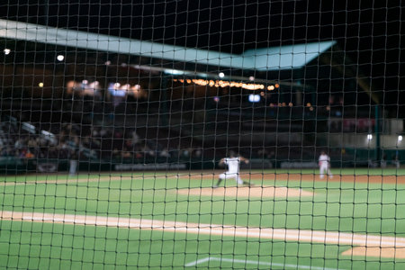 Selective focus on baseball foul ball safety netting.の写真素材