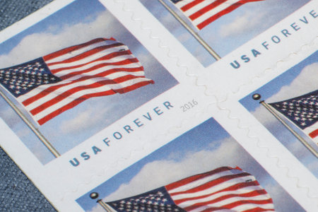 Lake Elsinore, CA, USA - July 3, 2024: Close up of four U.S.P.S. forever stampsの写真素材