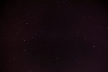 Background of a night time starry skyの写真素材