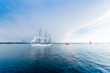 Tall ship on blue water horizontal