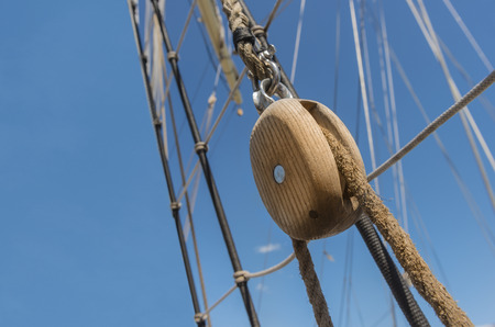 Wooden pulley on an old yacht.の写真素材