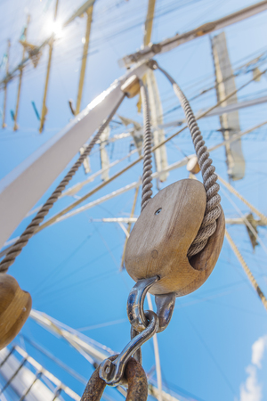 Wooden pulley on an old yacht.の写真素材