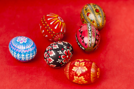 Easter eggs painted on red.の写真素材