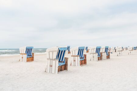 Beach - chairs on the island Sylt vertical. Germany.の写真素材
