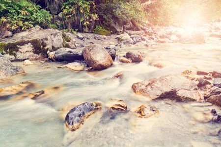 Small mountain river, stream -  view from above. Retro style.の写真素材