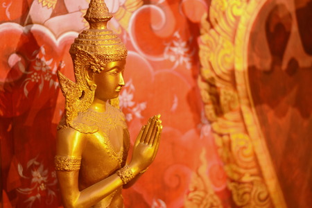 Golden Thai Statue in the Temple , Bangkok , Thailandの写真素材