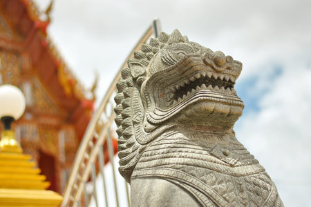 Beautiful Rock Lion Statue in the Thai Temple , Bangkok , Thailand