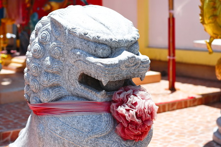 Beautiful Lion Stone Statue in Chinese Templeの写真素材
