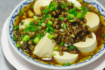 Chinese black olives with minced pork and tofuの写真素材