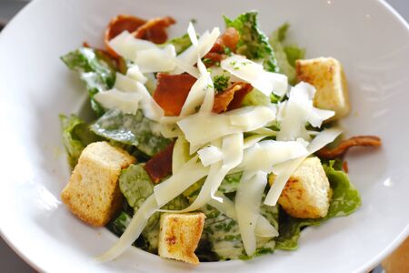 delicious fresh vegetable Caesar Salad and cheeseの写真素材