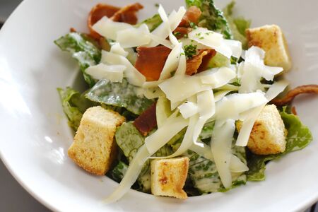 delicious fresh vegetable Caesar Salad and cheeseの写真素材