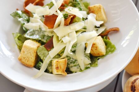 delicious fresh vegetable Caesar Salad and cheeseの写真素材