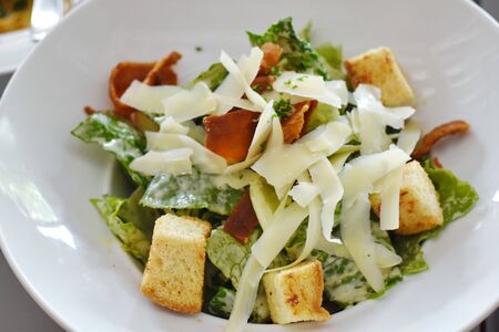 delicious fresh vegetable Caesar Salad and cheeseの写真素材