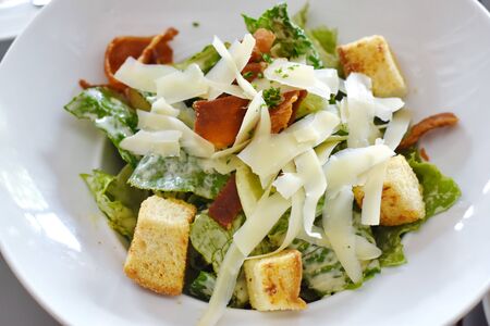delicious fresh vegetable Caesar Salad and cheeseの写真素材