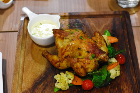 small chicken with thick gravy sauce