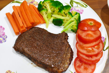 delicious meat steak Homemade with vegetableの写真素材