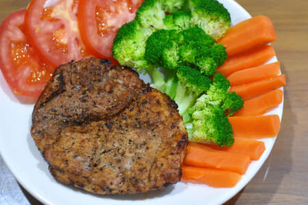 delicious meat steak Homemade with vegetableの写真素材