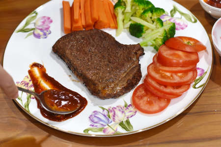delicious meat steak Homemade with vegetableの写真素材