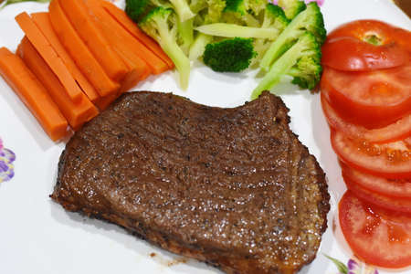 delicious meat steak Homemade with vegetableの写真素材
