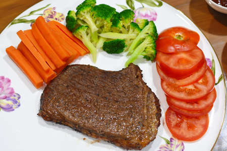 delicious meat steak Homemade with vegetableの写真素材