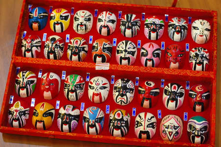 Oriental masks in a souvenir shop on the island of San Miguel, Azoresの写真素材